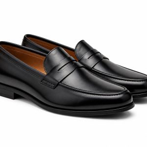 Black leather loafers — white background