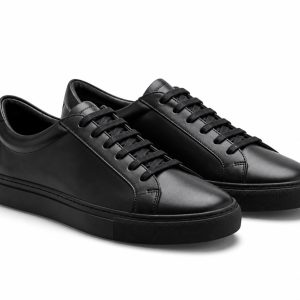 Minimal black leather sneakers