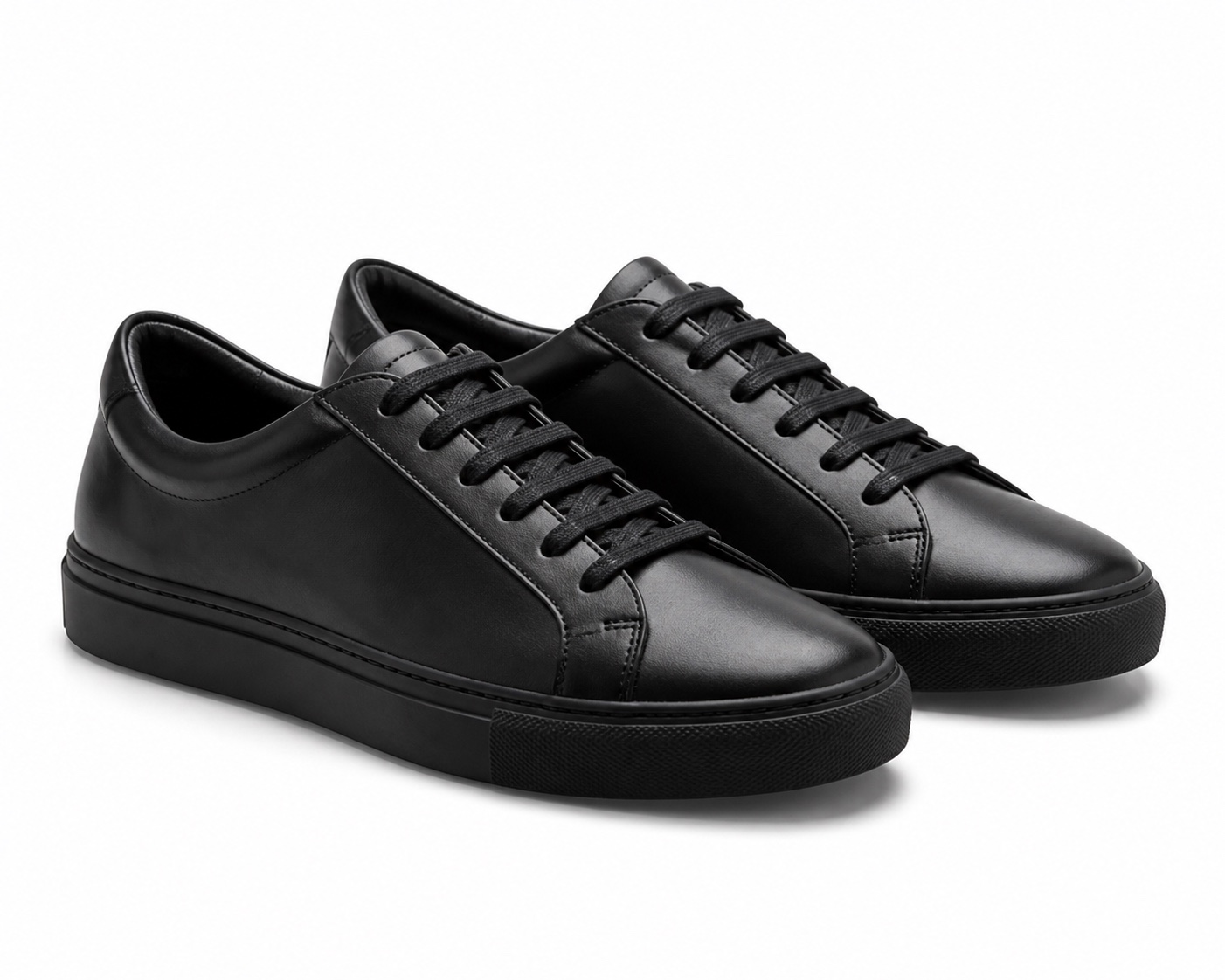 Minimal black leather sneakers